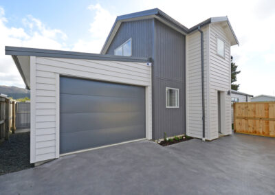 A 2 story house and garage built through Skyline Buildings