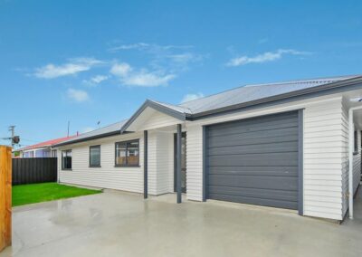 A cream Skyline house and garage